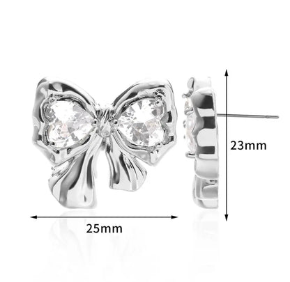 BOW EARRINGS ‎