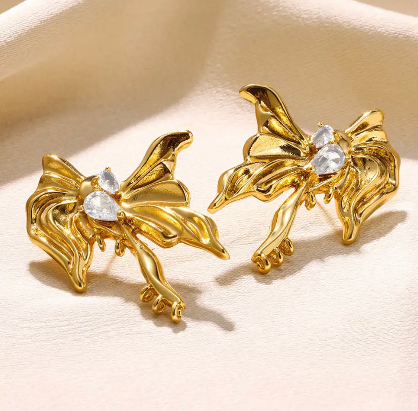 BOW EARRINGS ‎