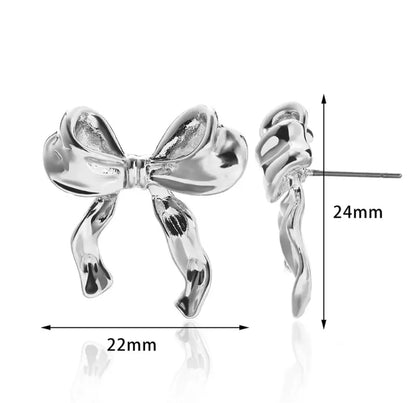 BOW EARRINGS ‎