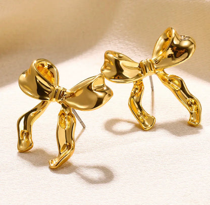 BOW EARRINGS ‎