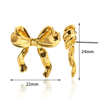 BOW EARRINGS ‎