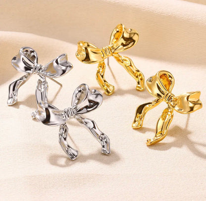 BOW EARRINGS ‎