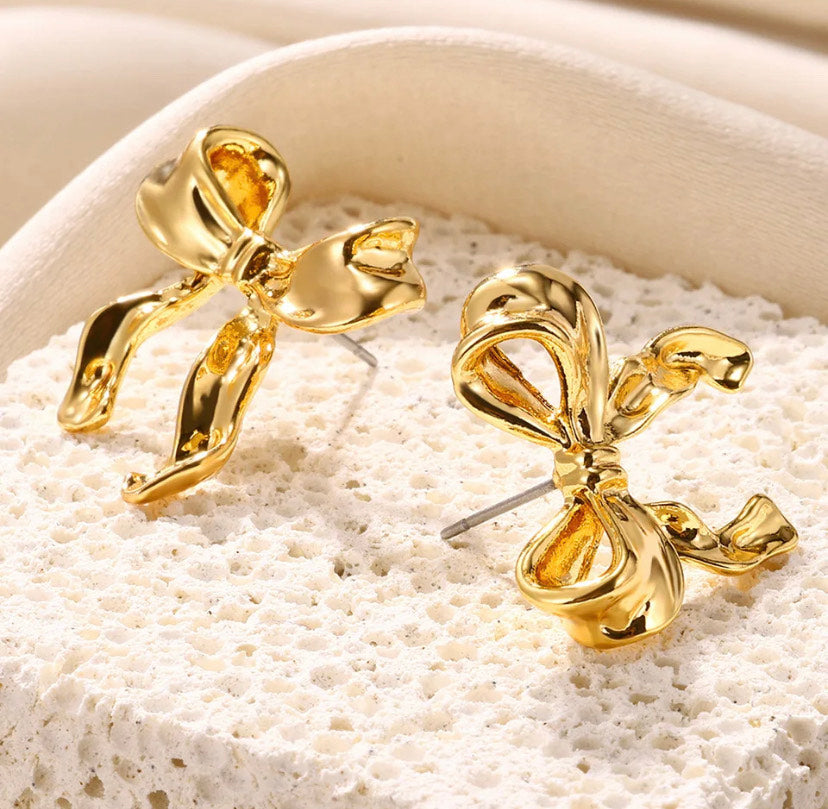 BOW EARRINGS ‎